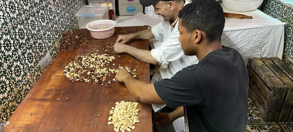 A student and community member handling food.